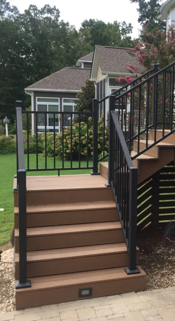 newly installed deck with staircase and railing